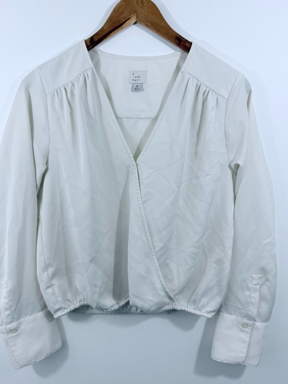 A New Day Long-sleeve faux-wrap blouse deep V-neckline gathered shoulders elasti